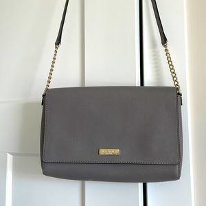 Gray Kate spade Crossbody with gold accents